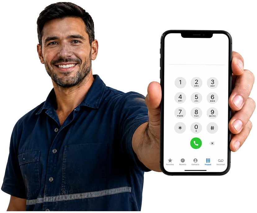 Plumber on the phone taking a Carlton callout